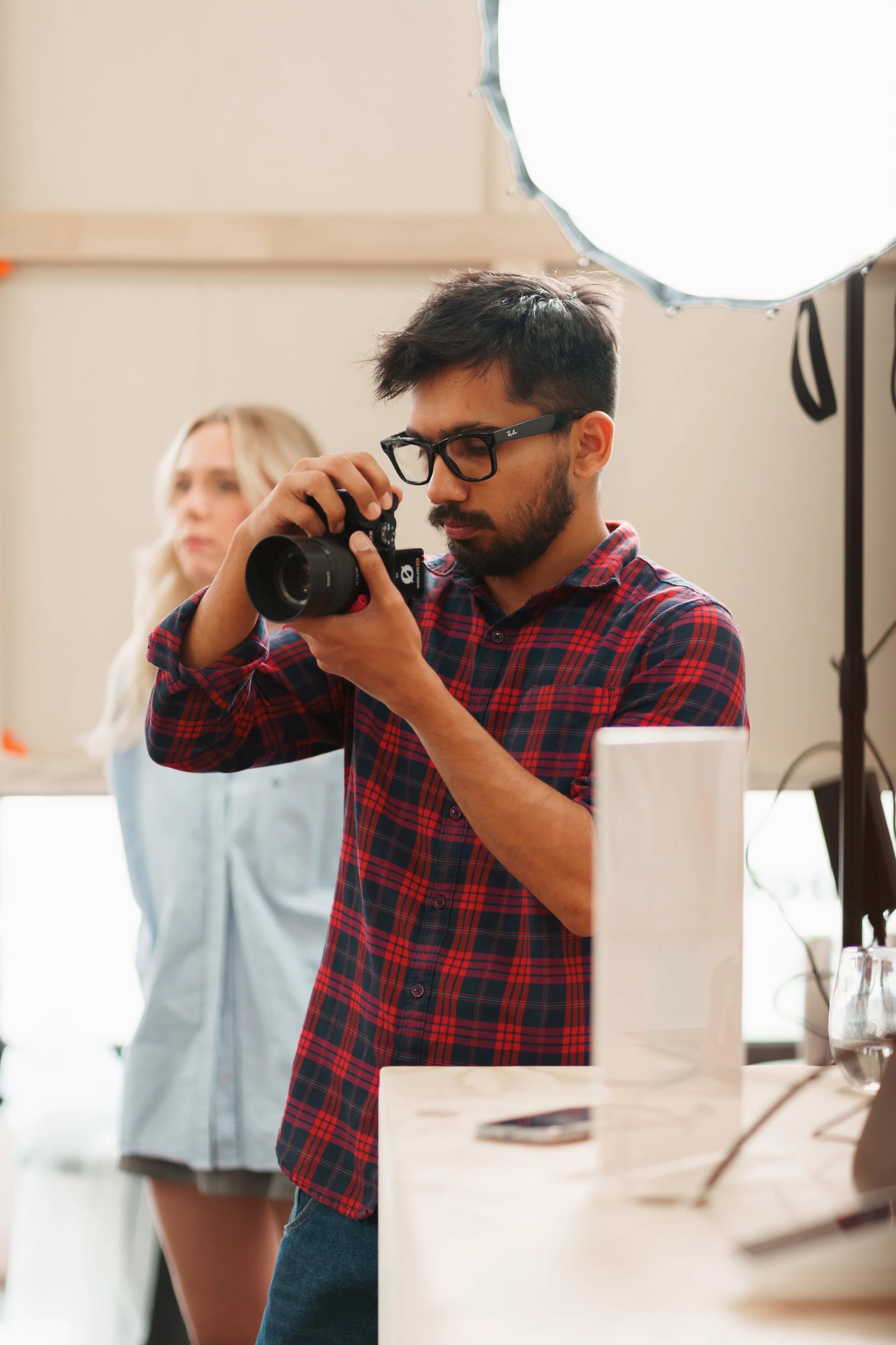 Sam — Melbourne photographer, videographer and content creator, behind the camera in studio